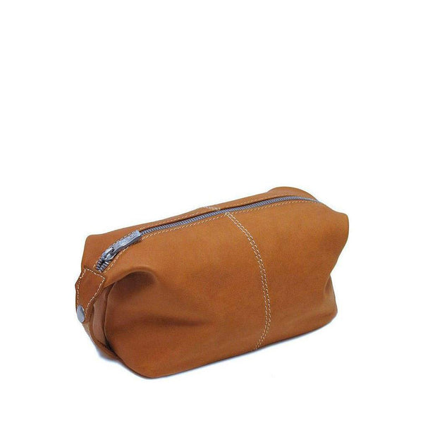 The Floto Parma Travel Kit is a leather Dopp kit make-up bag that is handcrafted in Italy with our famous Parma leather. Parma leather is tanned in a special way with no chemicals so the bag will get better as it ages - each Toiletry bag takes on a unique look and darkens like a saddle over time. Parma is leather tanning the natural way.